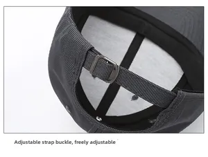 Close-up of the adjustable metal buckle and dark gray fabric on this baseball cap