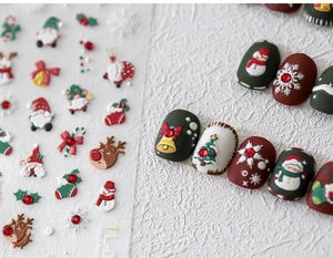 Detailed 3D embossed Christmas nail stickers featuring Santa, reindeer, and snowflakes