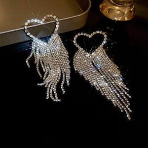 Elegant fan-shaped heart fringe earrings with cubic zirconia and long sparkling tassels