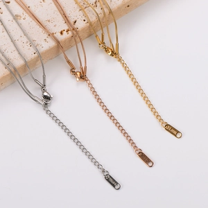 Double-layered gold bead necklaces in silver, rose gold, and gold stainless steel finish