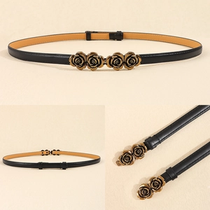 Detailed views of women's black slim belt featuring an elegant gold rose buckle design