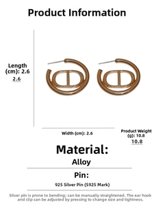 Macro view of gold CD letter earrings with S925 silver needles and product dimensions