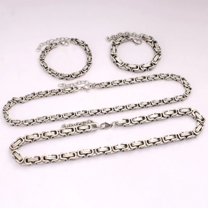 Detailed set of silver Byzantine chain necklaces and bracelets with lobster clasps