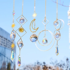 Solar crystal suncatcher with golden metal moon and star prisms for window hanging decor