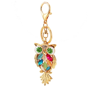Cute golden owl keychain with colorful crystals and green four-leaf clover eyes charm