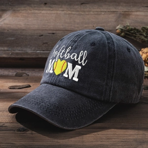 Close-up of Softball MOM embroidery and yellow heart ball on washed cotton cap