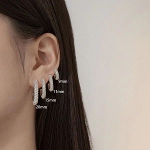 Comparison of S925 silver hoop earrings in 9mm, 11mm, 15mm, and 20mm sizes on ear