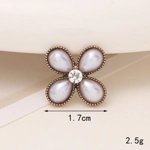 Detailed macro view of 1.7cm pearl flower charm with 2.5g lightweight alloy frame