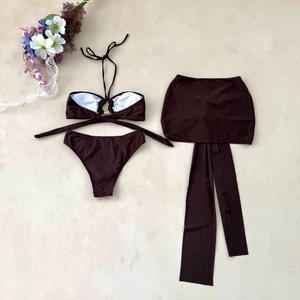 Deep coffee three-piece bikini set with metal ring detail and high-waist sarong skirt