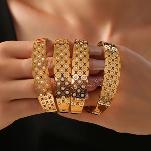 Elegant gold plated stainless steel hollow bangles set with sparkling cubic zirconia