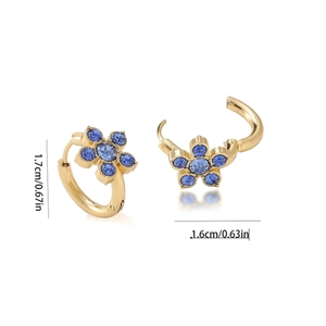 Macro view of gold-plated flower earrings with blue crystals and size measurements