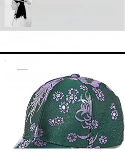 Detail of dark green satin baseball cap featuring purple floral embroidery and firm crown