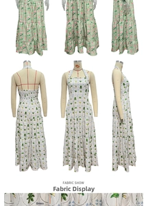 Detail of floral printed halter maxi dress showing elastic back and tiered ruffle hem