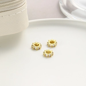 Trois perles d'espacement dorées en forme d'engrenage avec zircons pour bijoux DIY