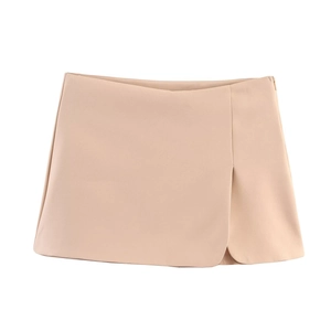 Minimalist high waisted beige skort with side slit design and invisible zipper detail