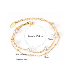 Detail of 18K gold-plated double-layer bracelet with 6mm and 3mm white pearls