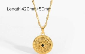 Detail of gold starburst necklace with black gem and wave chain, length 420mm+50mm