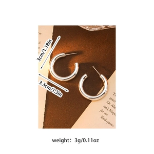 Detailed view of silver C-shaped flower earrings with size and weight specifications