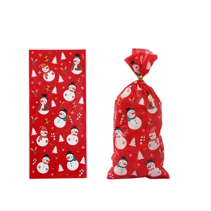 Red Christmas OPP gift bags with festive snowman and reindeer prints for candy packaging