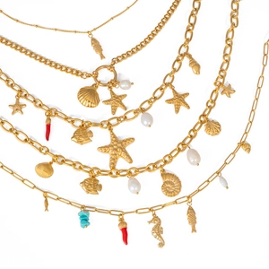 Gold multi-layer necklace with sea shell star and pearl pendants for beach vacations