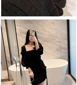 Detail of square neck and ruffle sleeves on elegant black textured mini party dress