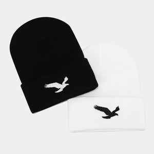 Men and women's knitted beanies with eagle embroidery in black and white styles