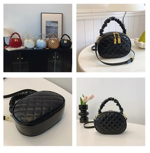 Elegant quilted handbags in various colors featuring a unique pleated top handle.