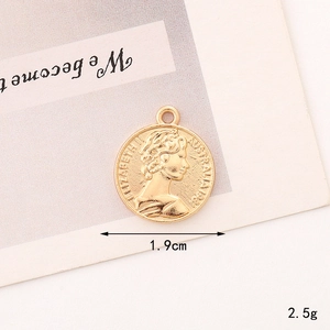Detailed view of golden coin pendant with Elizabeth II relief and 1.9cm size specs