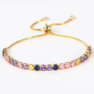 Detail of gold bolo bracelet with micro-paved multi-color square cubic zirconia stones