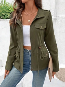 Close-up of army green jacket showing waist drawstring and detailed twill fabric texture