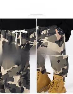 Detail view of men's camo cargo pants showing drawstring waist, pockets, and cuffed hems