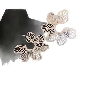 Elegant gold hollow flower earrings with intricate leaf vein texture for women