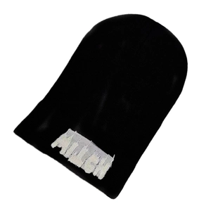 Classic black knitted beanie with white letter embroidery for street style and winter warmth
