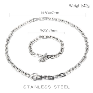 Detailed view of stainless steel punk chain necklace and bracelet set with OT clasp