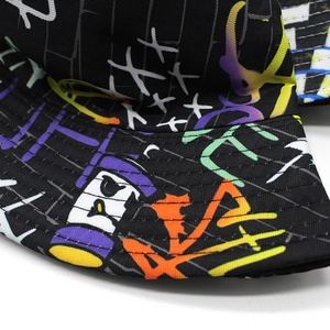 Graffiti bucket hat with colorful street art patterns and reinforced stitching