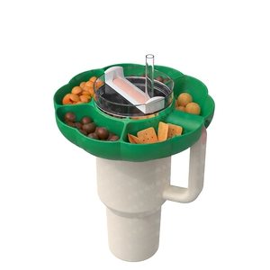 Close-up of a 5-compartment silicone snack bowl accessory for 40oz tumblers in green