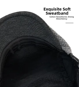 Detailed macro view of the soft cotton sweatband inside the knitted newsboy beret hat