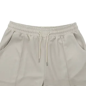 Detail of waffle knit fabric texture on casual shorts with drawstring elastic waistband