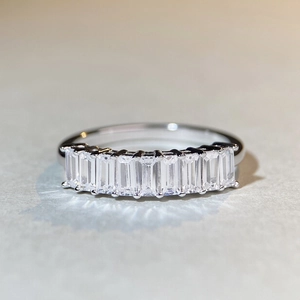 Silver S925 emerald cut zircon eternity ring featuring nine step-cut clear stones