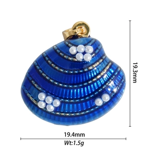 Detail showing blue enamel shell pendant with pearls measuring 19.3mm by 19.4mm