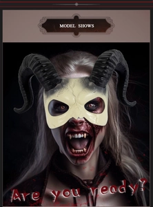 Close-up of white devil skull mask with large black spiral horns for costume cosplay