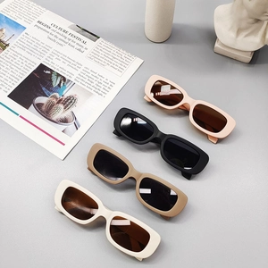 Trendy kids square frame sunglasses in pink, black, brown, and cream colors