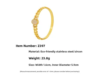 Macro detail of 18K gold plated NK chain bracelet with pave zircon oval buckle
