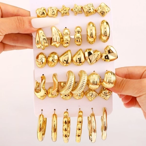 Gold-toned geometric earring set featuring star heart and C-shaped hoops for women