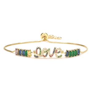 Gold adjustable bracelet with colorful zircon LOVE charm and heart eye accents
