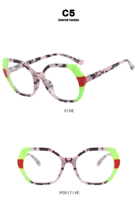 Pink tortoiseshell TR90 polygonal eyeglasses frame with green and red contrast accents