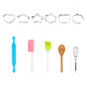 Detailed view of 11-piece kids baking set including cookie cutters and rolling pin with sizes