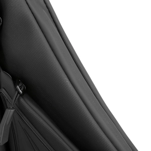 Close-up of waterproof textured fabric and zipper detail on the black crossbody chest bag