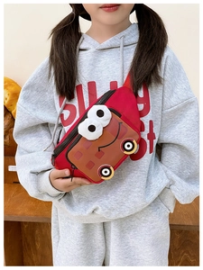Detail of red cartoon car kids waist bag in nylon with dual zippers on a gray hoodie