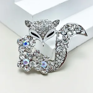 Sparkling fox brooch with white crystals and colorful rhinestones on a silver base